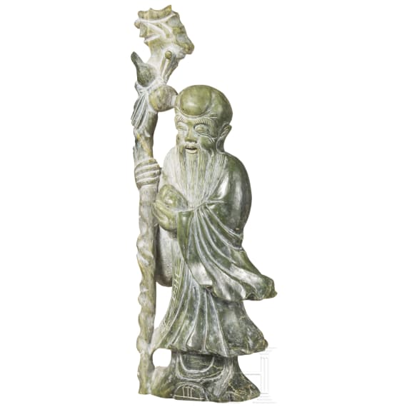 A figure of the god Shoulao in light green nephrite, 20th century