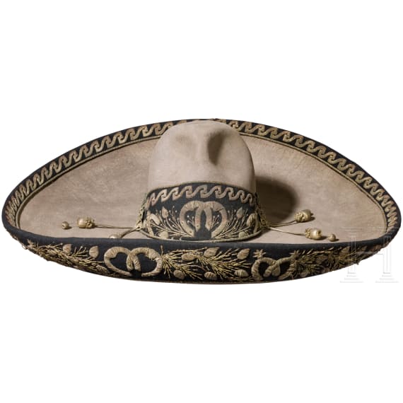 A sombrero with silver embroidery and a long knife, Mexico, 19th century