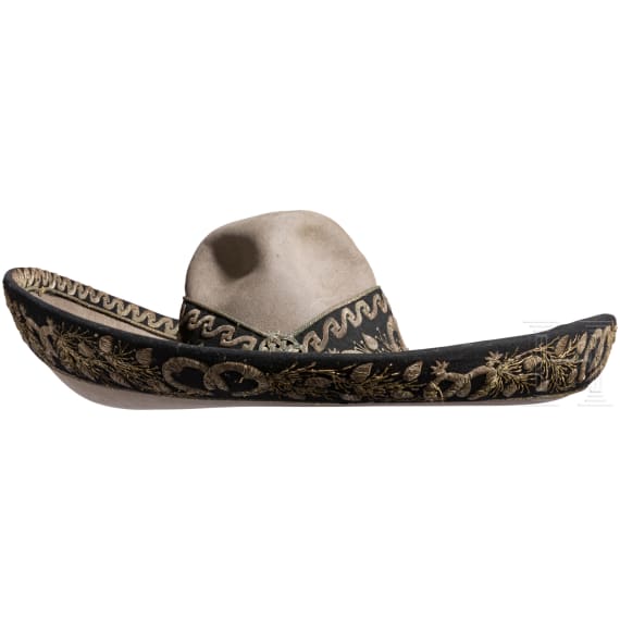 A sombrero with silver embroidery and a long knife, Mexico, 19th century