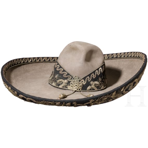 A sombrero with silver embroidery and a long knife, Mexico, 19th century