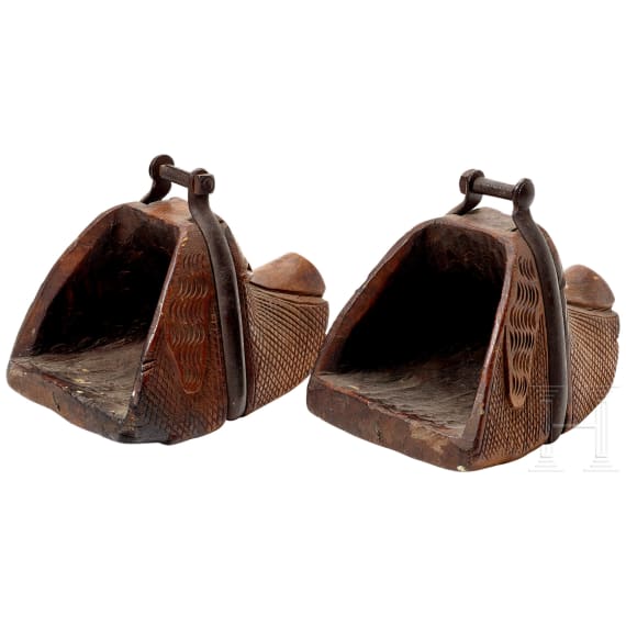 A pair of South American stirrups in the shape of a dog's head, 19th century