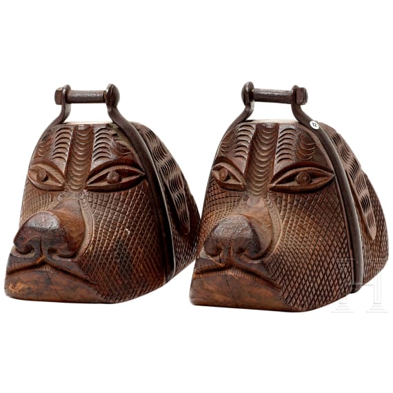 A pair of South American stirrups in the shape of a dog's head, 19th century