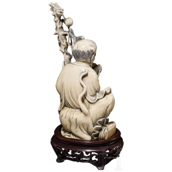 An ivory figure of Shou, god of longevity, China, 1st half of the 20th century