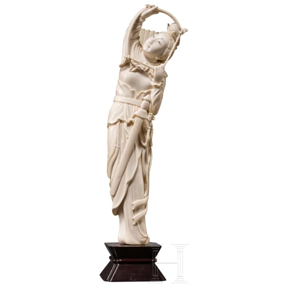 An ivory figure of an archer, China, 1st half of the 20th century
