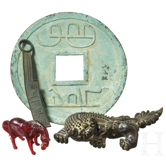 Four antique Chinese objects, horse, guardian lion, coins