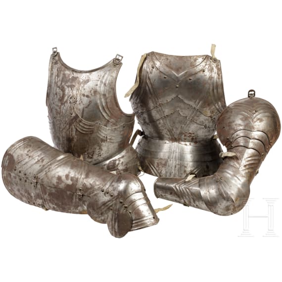 Four Gothic harness parts, in the style around 1480/90