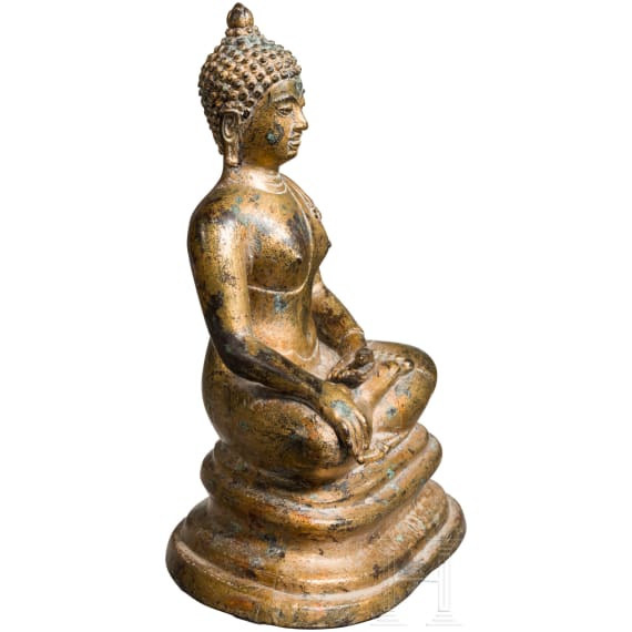 A gold lacquered bronze Buddha, South East Asia