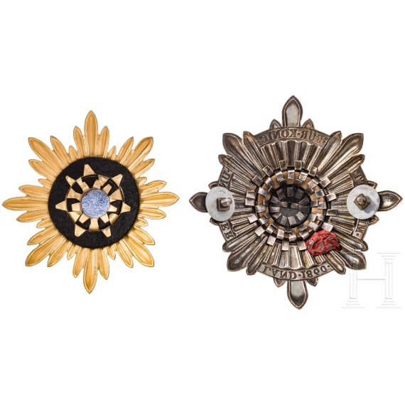 Two German helmet emblems