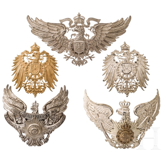 Five German helmet emblems