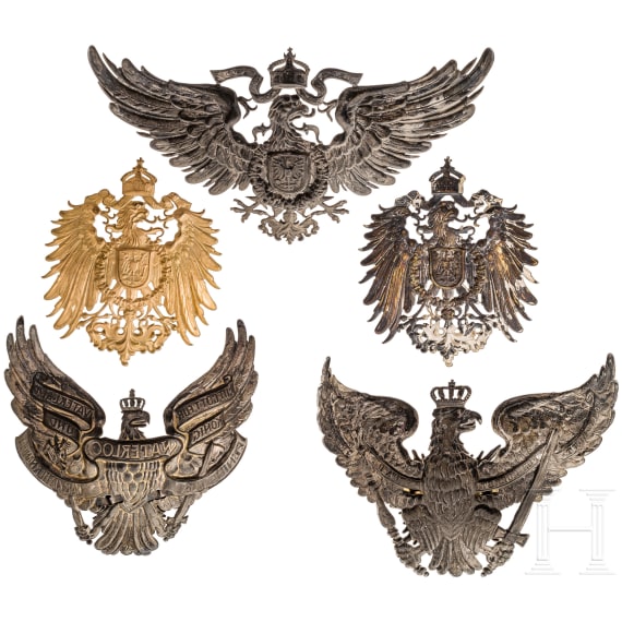 Five German helmet emblems