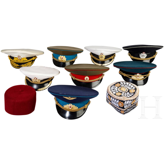 Eight Soviet visor caps, mostly for officers