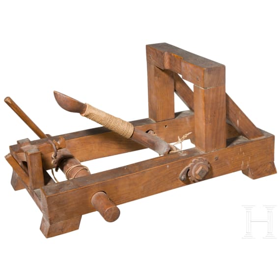A detailed model of a catapult, circa 1900