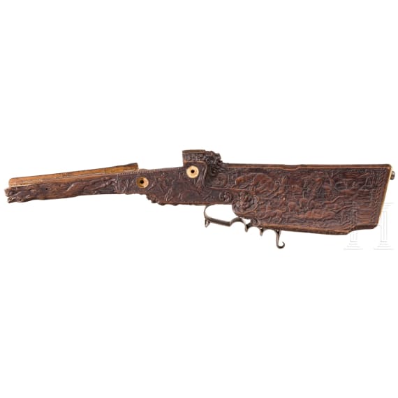 A fine carved stock of a wheellock rifle, Swabia, circle of Michael Maucher, ca. 1680