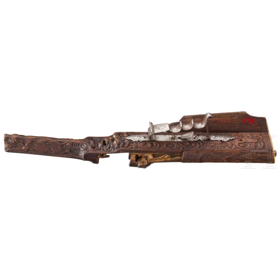 A fine carved stock of a wheellock rifle, Swabia, circle of Michael Maucher, ca. 1680