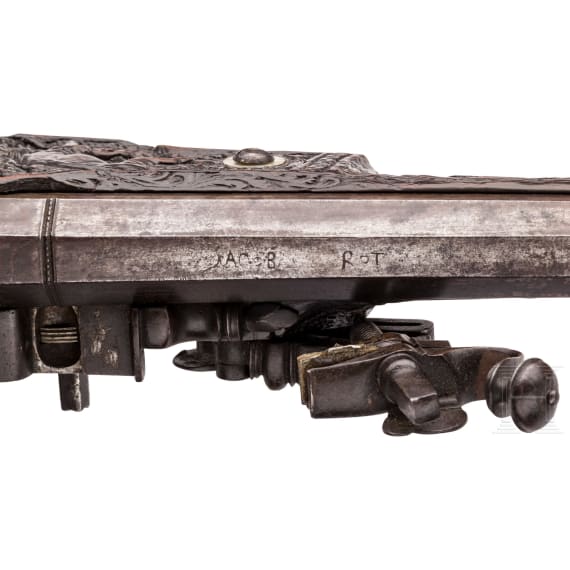 A southern German carved wheellock rifle with mother-of-pearl inlays in the style of the Maucher family of Schw&auml;bisch-Gm&uuml;nd, late 17th century
