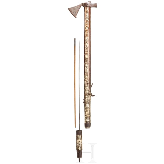 A Silesian battle axe with integrated flintlock and dagger, circa 1700