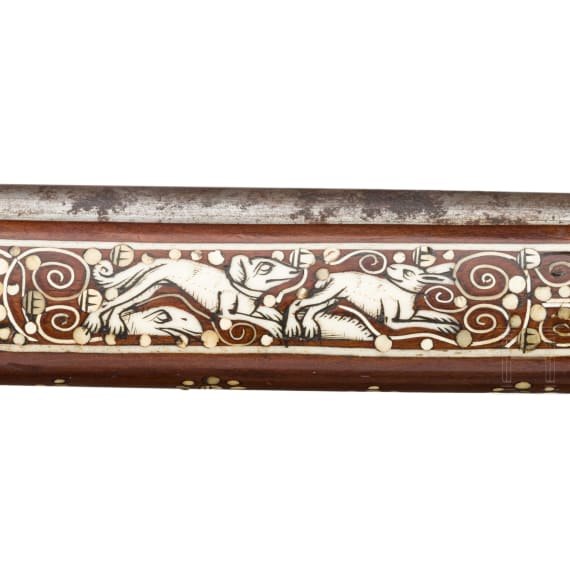 A Silesian battle axe with integrated flintlock and dagger, circa 1700