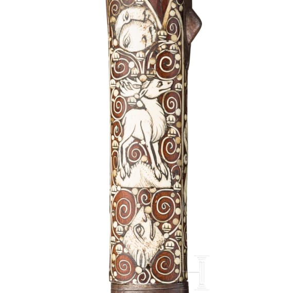 A Silesian battle axe with integrated flintlock and dagger, circa 1700