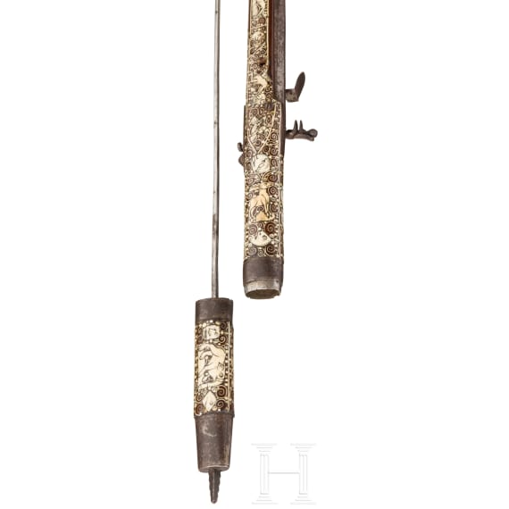 A Silesian battle axe with integrated flintlock and dagger, circa 1700
