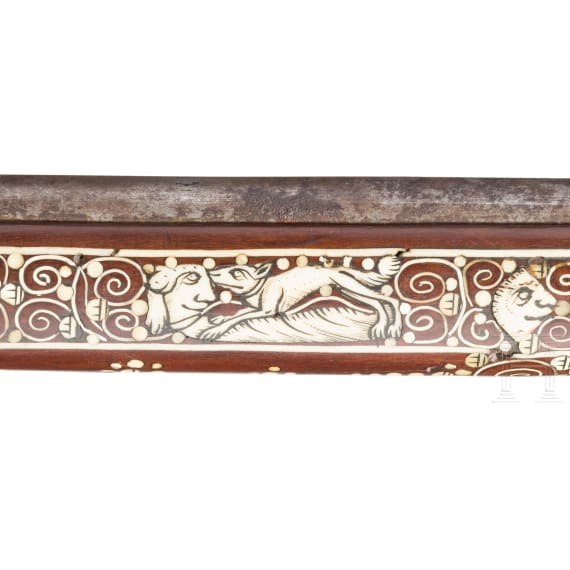 A Silesian battle axe with integrated flintlock and dagger, circa 1700