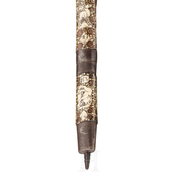 A Silesian battle axe with integrated flintlock and dagger, circa 1700
