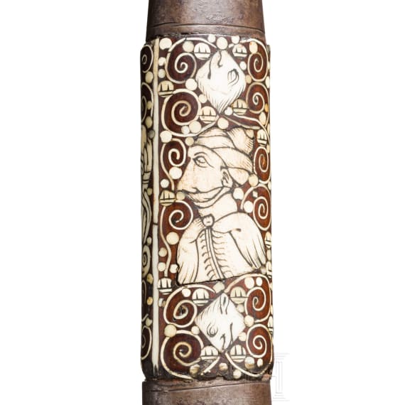 A Silesian battle axe with integrated flintlock and dagger, circa 1700