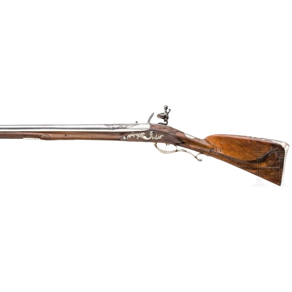 A silver-mounted flintlock rifle, Friedrich Ostermann, Copenhagen, circa 1710/20