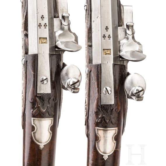 A pair of silver-mounted flintlock rifles, Elferding, Onoldsbach (Ansbach/Bavaria), circa 1730