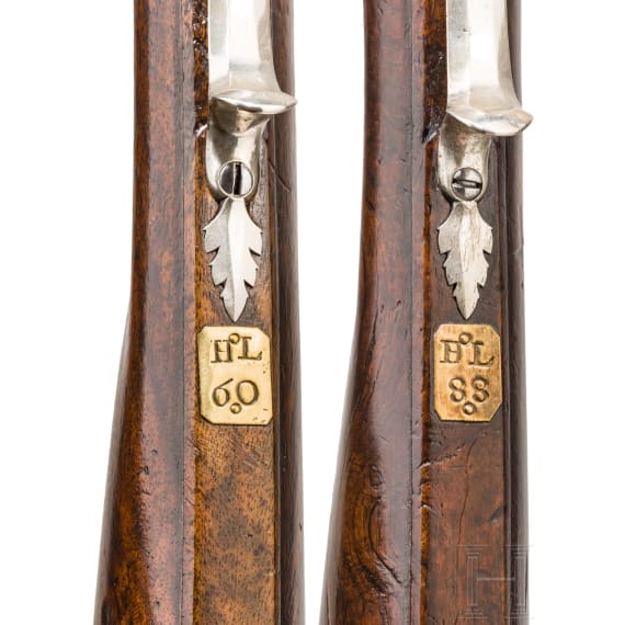A pair of silver-mounted flintlock rifles, Elferding, Onoldsbach (Ansbach/Bavaria), circa 1730