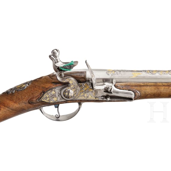 A French flintlock shotgun with chiselled decorations, circa 1740