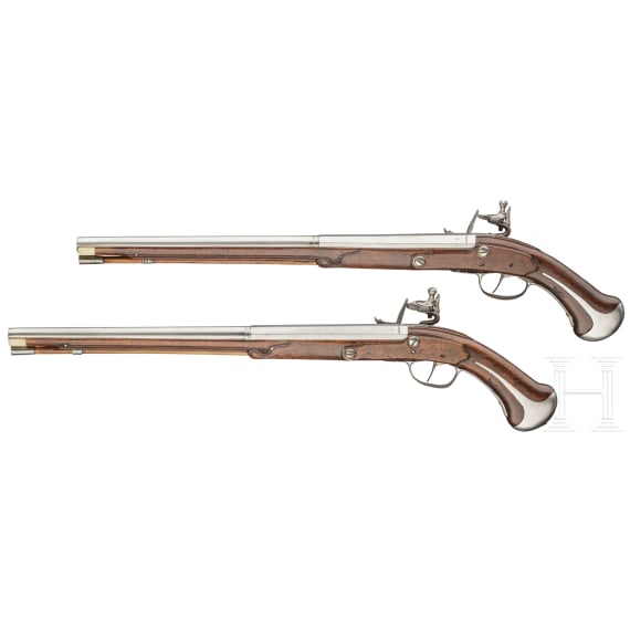 A rare pair of flintlock holster pistols made for superimposed loads, from the armoury of the Princes of Salm-Reifferscheidt-Dyck, northern German or Dutch, circa 1660