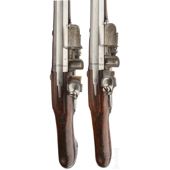 A rare pair of flintlock holster pistols made for superimposed loads, from the armoury of the Princes of Salm-Reifferscheidt-Dyck, northern German or Dutch, circa 1660