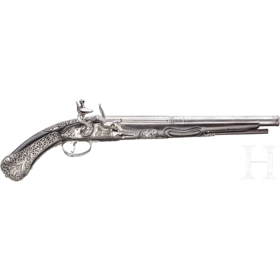 A chiselled flintlock pistol, Brescia, late 17th century