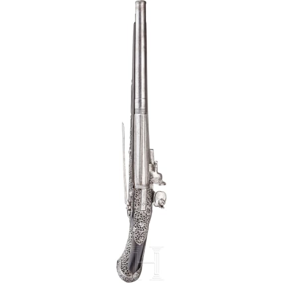 A chiselled flintlock pistol, Brescia, late 17th century