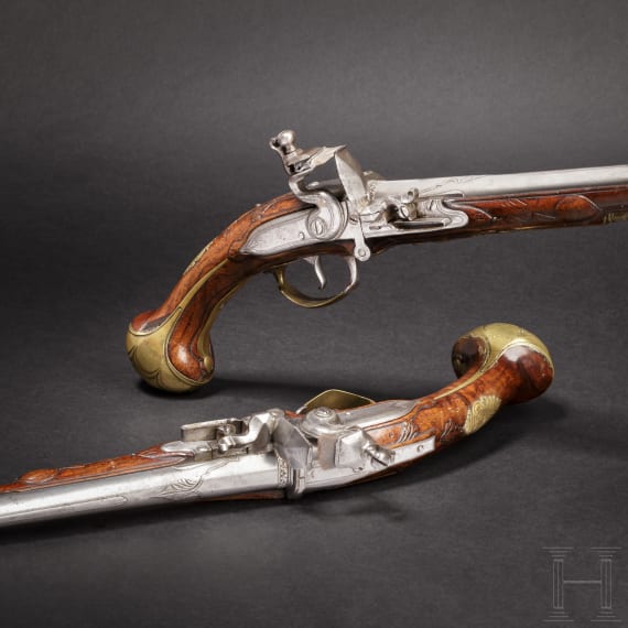 A pair of Flemish, long breechloading flintlock pistols, circa 1720/30
