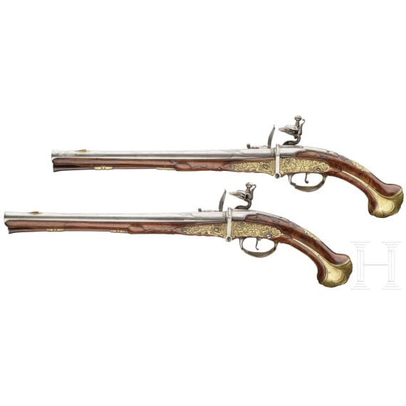 A pair of Flemish, long breechloading flintlock pistols, circa 1720/30