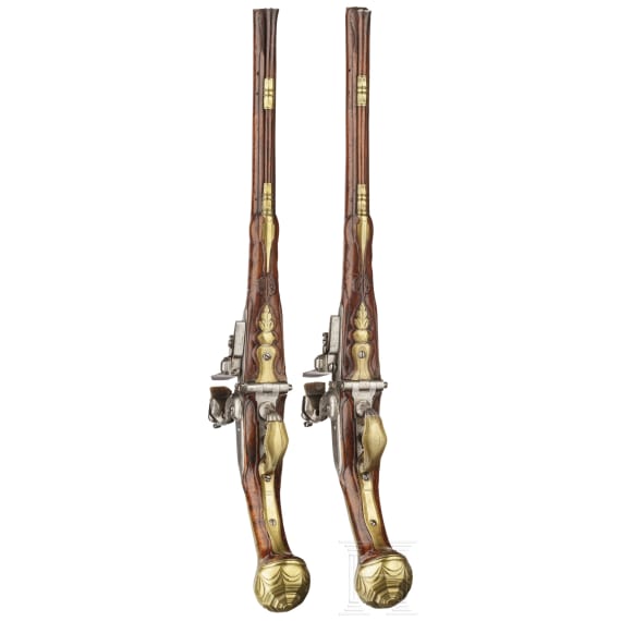 A pair of Flemish, long breechloading flintlock pistols, circa 1720/30