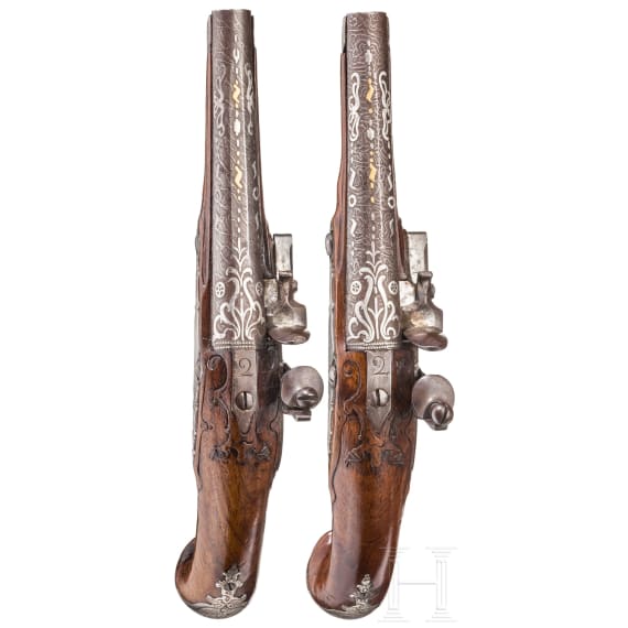 A pir of silver-mounted flintlock travel pistols, German/France, ca. 1730