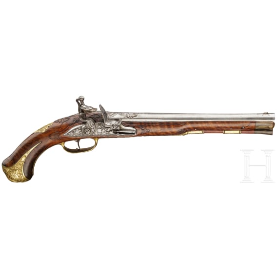 A deluxe German flintlock pistol with fine chiselling, circa 1730
