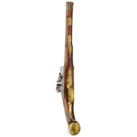 A deluxe German flintlock pistol with fine chiselling, circa 1730