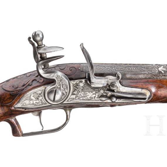 A silver-mounted long flintlock pistol, Dresden, ca. 1740