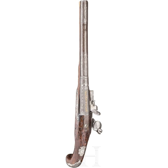 A silver-mounted long flintlock pistol, Dresden, ca. 1740