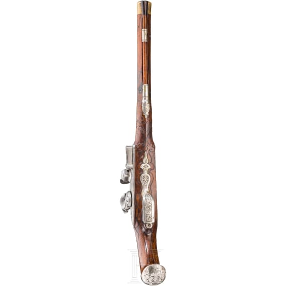 A silver-mounted long flintlock pistol, Dresden, ca. 1740