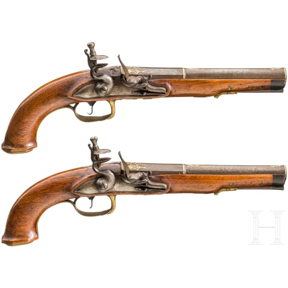 A pair of German flintlock pistols with silver and gold inlays, circa 1800