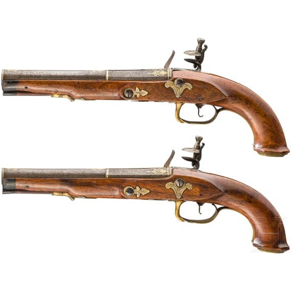 A pair of German flintlock pistols with silver and gold inlays, circa 1800