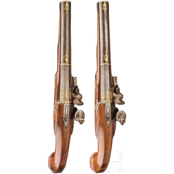 A pair of German flintlock pistols with silver and gold inlays, circa 1800