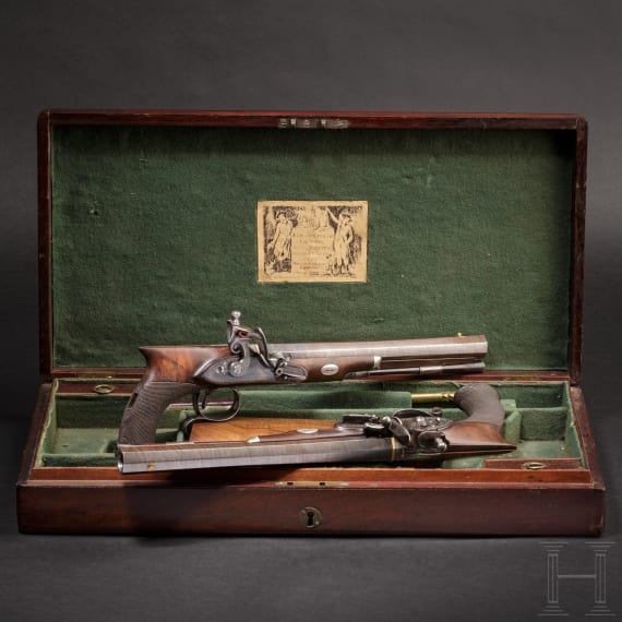 A cased pair of flintlock pistols with a detachable stock, H. W. Mortimer & Co. of London, circa 1810