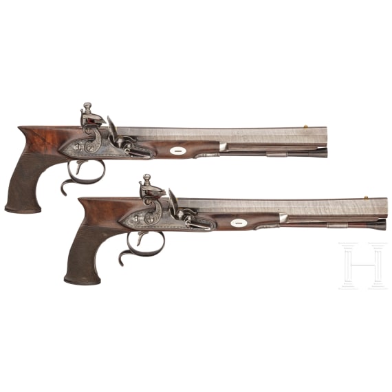 A cased pair of flintlock pistols with a detachable stock, H. W. Mortimer & Co. of London, circa 1810