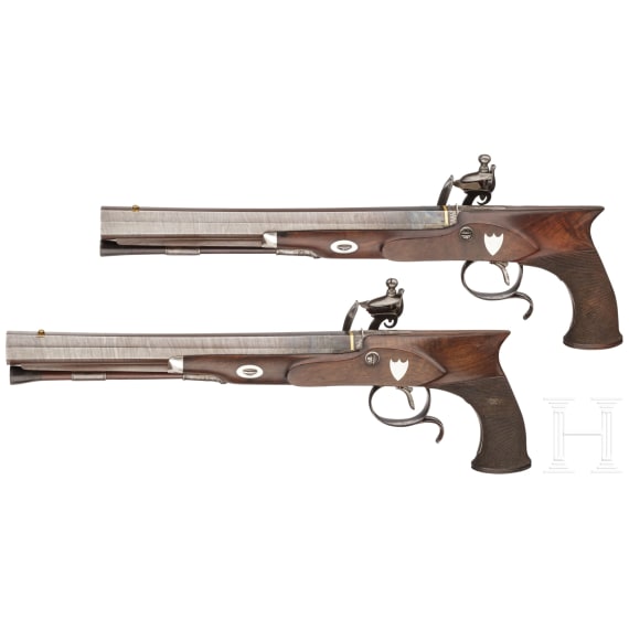 A cased pair of flintlock pistols with a detachable stock, H. W. Mortimer & Co. of London, circa 1810
