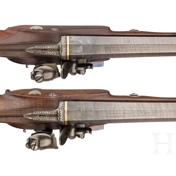 A cased pair of flintlock pistols with a detachable stock, H. W. Mortimer & Co. of London, circa 1810